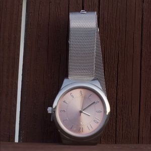 Silver and rose gold watch